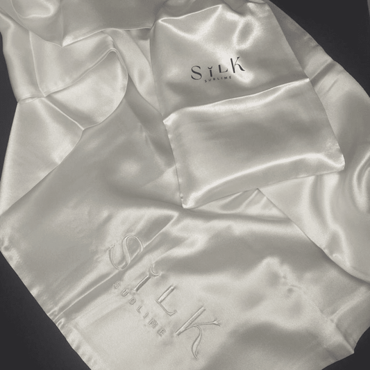 taie d'oreiller en soie blanc bien à plat