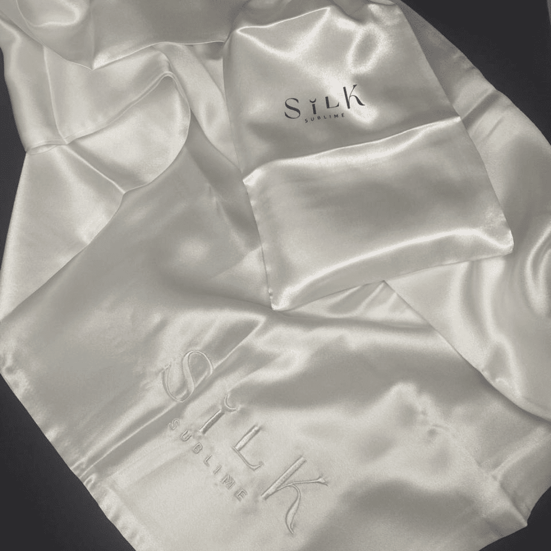 taie d'oreiller en soie blanc bien à plat