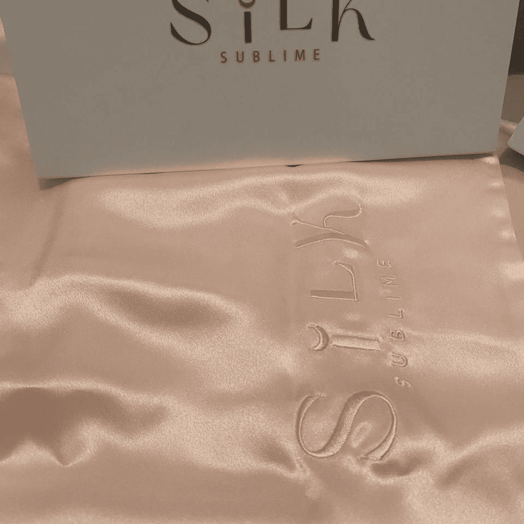 taie d'oreiller en soie rose clair