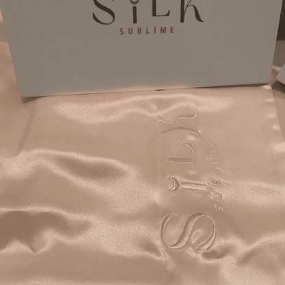 taie d'oreiller en soie rose clair