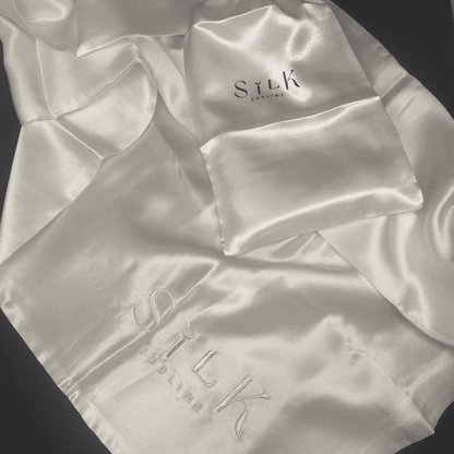 taie d'oreiller en soie blanc bien à plat